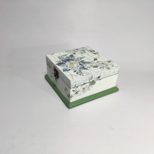 Blue wooden jewellery box with lid closure and decorative details