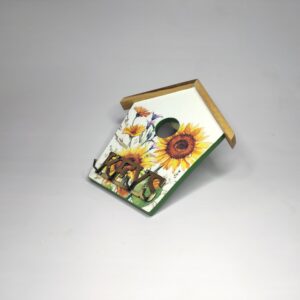 Decorative wooden key holder featuring sunflower decoupage design