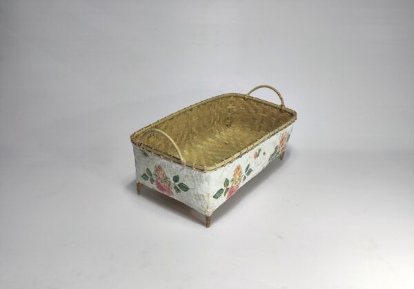 Bamboo basket with vintage-inspired peach pattern
